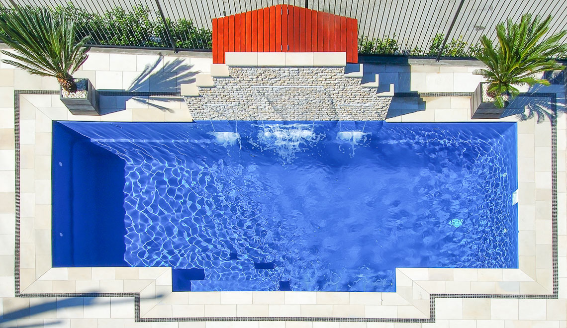 Leisure Pools Elegance large in-ground fiberglass swimming pool