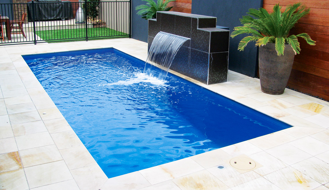Leisure Pools Palladium Plunge rectangular composite swimming pool with built-in steps