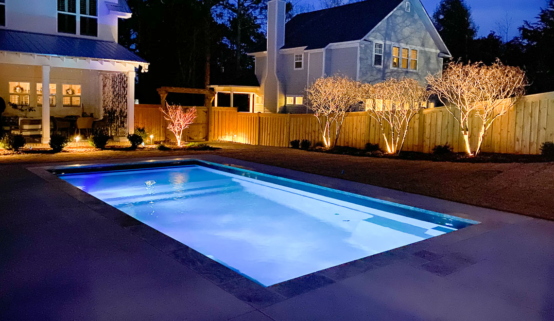 Leisure Pools Summit large composite swimming pool with integrated splash deck
